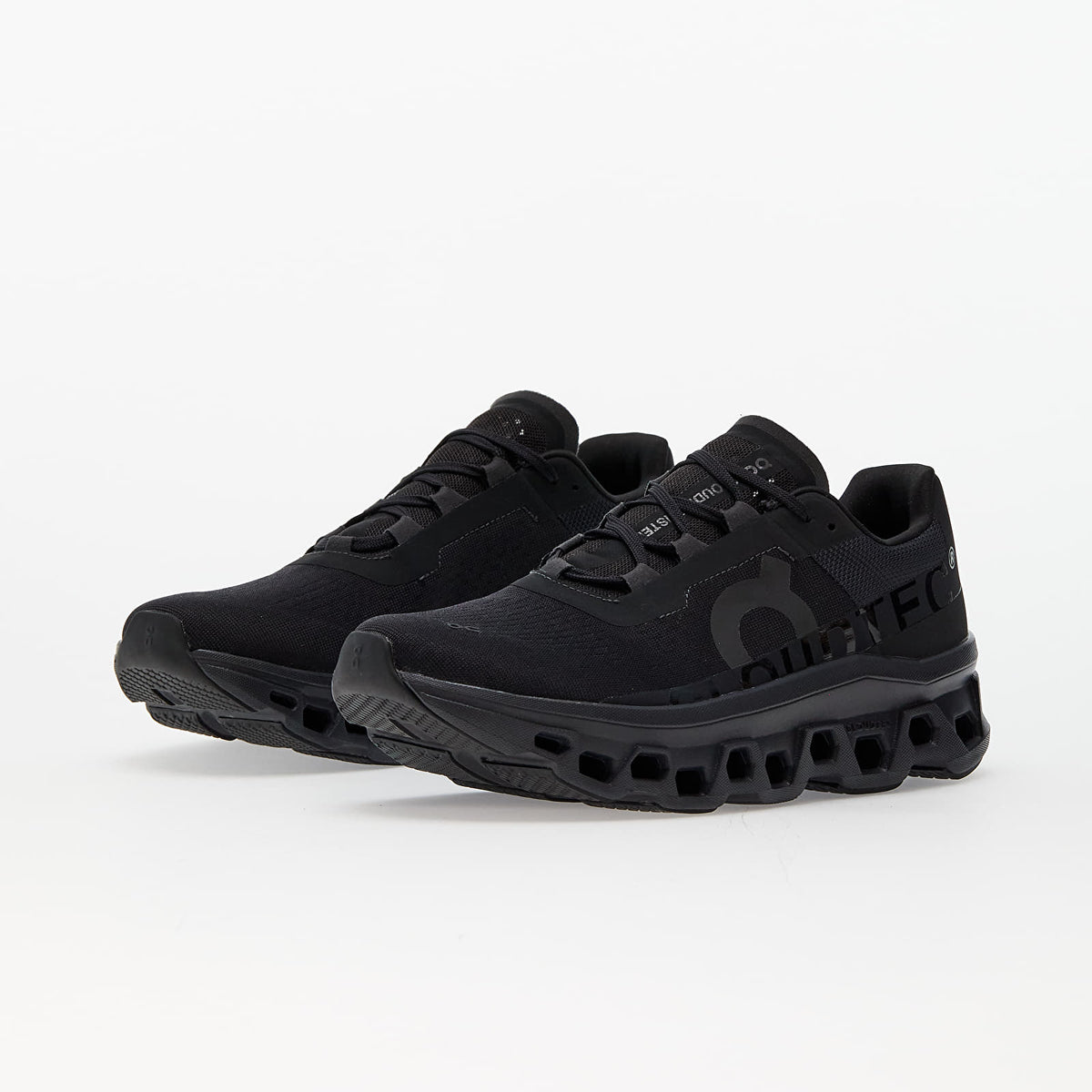 On Cloudmonster — All Black